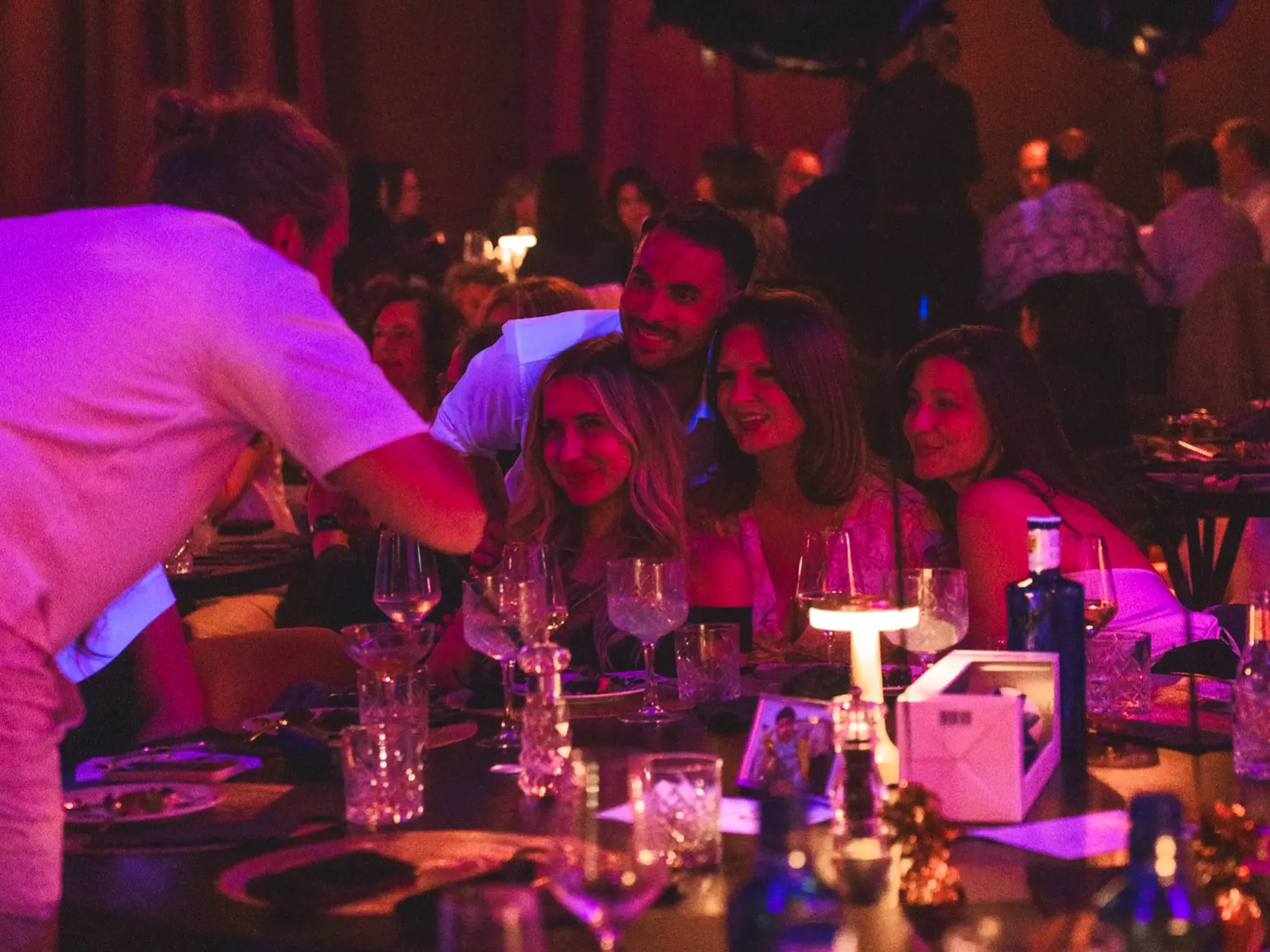 Guests at dinner in the main room