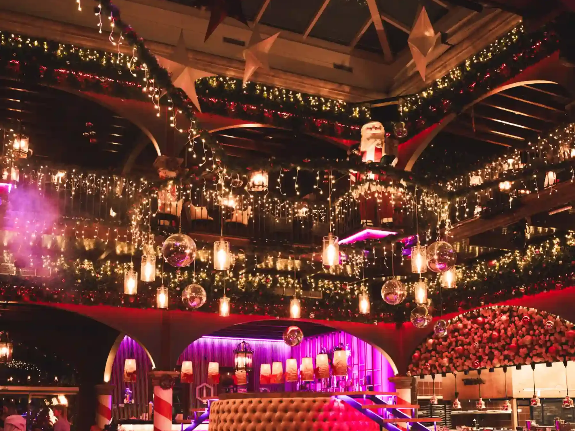 The main dining room under festoon lights and disco balls